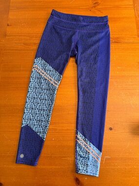 Athleta Purple Leggings with Light Blue Panels and Orange Trim